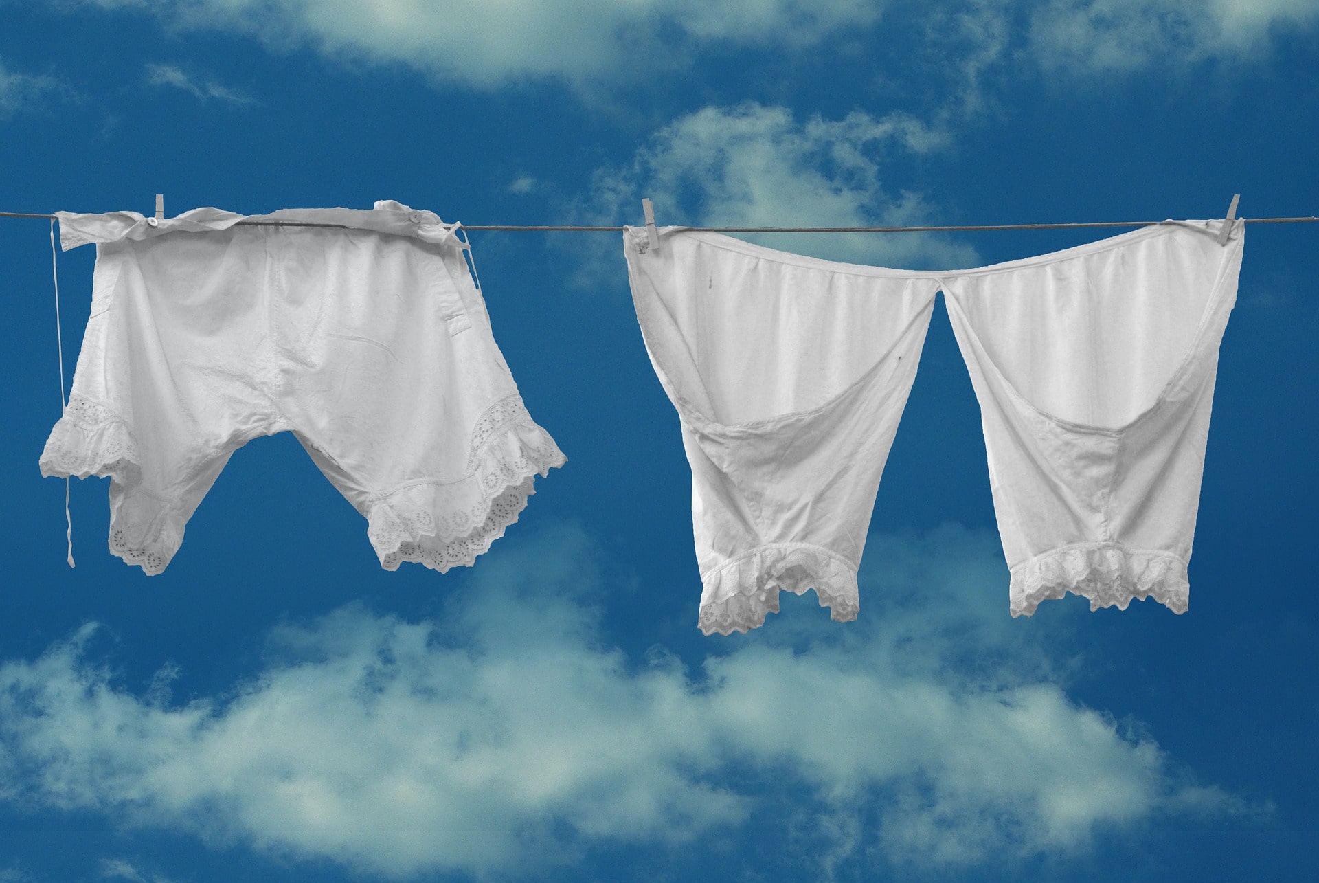 a clothesline with two white pieces spread out